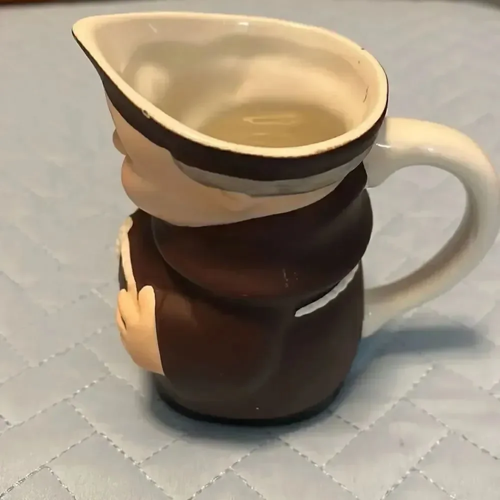 Vintage Goebel Friar tuck creamer 1950’s  imperfections around rim. See photos.